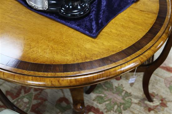 An early Victorian birds eye maple and rosewood crossbanded circular tilt top table, W.4ft 1in.